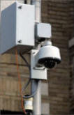 Surveillance cameras and acoustic gunshot detection sensor system.